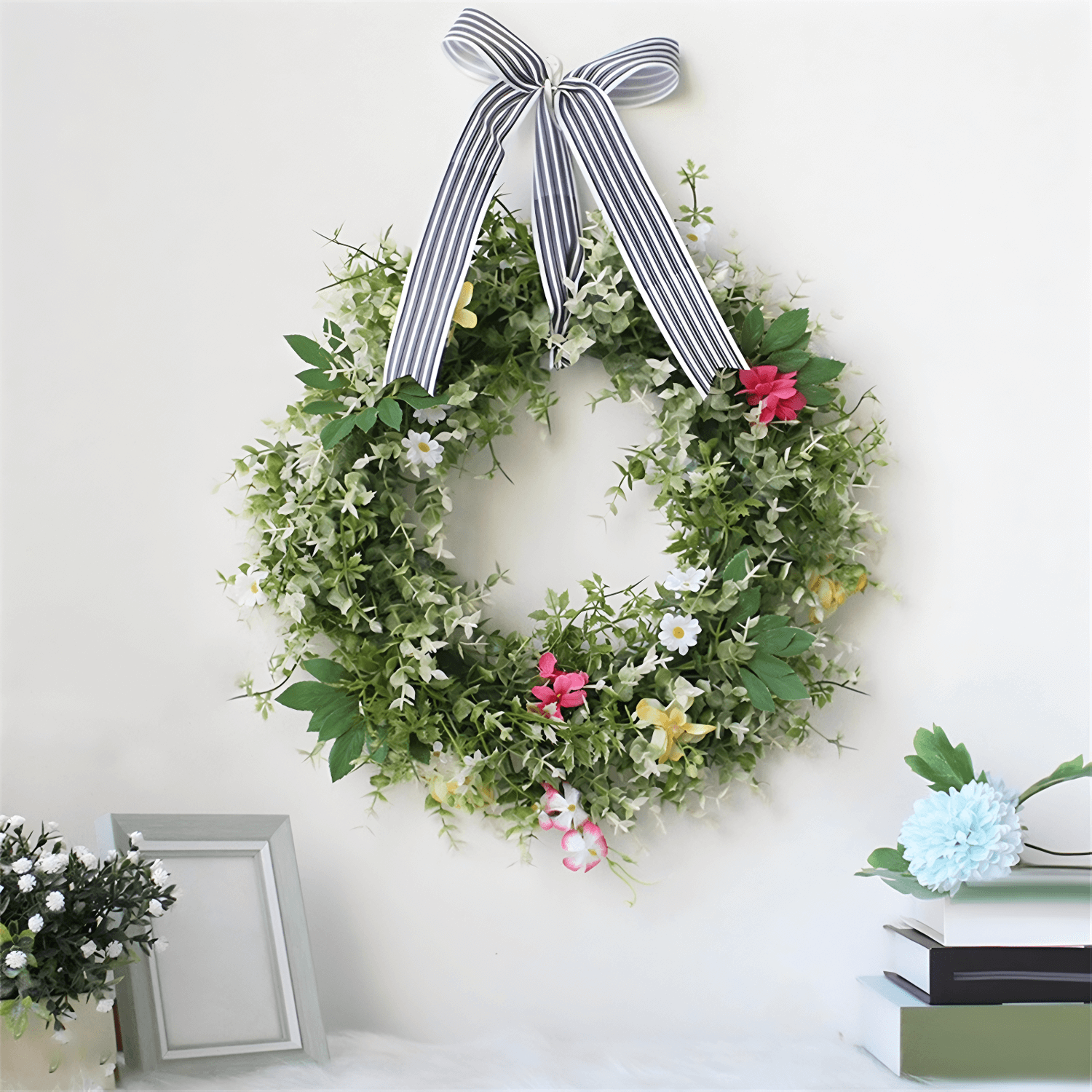 Boxwood wreath with striped bow 