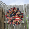 star wreath on a fence