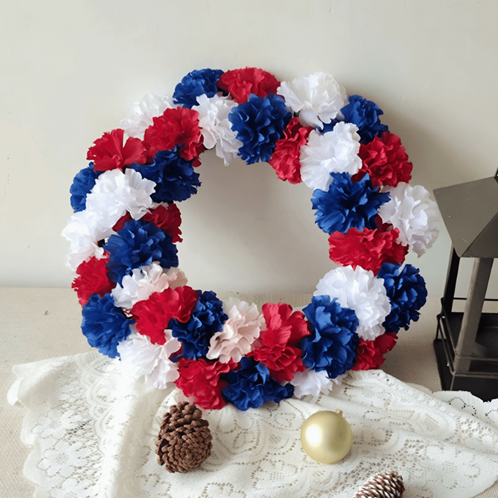 4th of july mesh wreath on a table