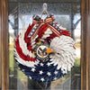American Eagle Wreath made from a DIY kit, hanging on a glass front door in July