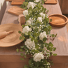 baby breath garland on a table