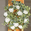 baby's breath garland on a pole