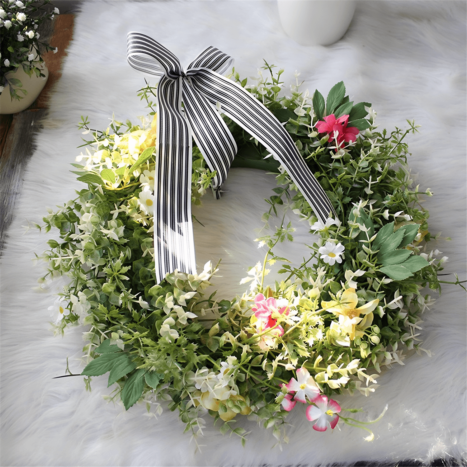 Boxwood wreath with black and white bow