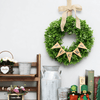 Boxwood wreath with burlap bow