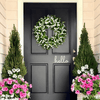 faithful wishes wreath on a door