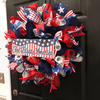 god bless usa wreath on a door