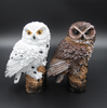 Load image into Gallery viewer, side by side photo of white and brown versions of solar owl garden light